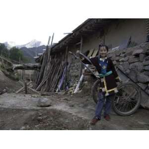  Rural Resident of Qinghai Province in a Farmyard, China 