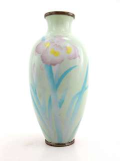 bottom of vase dimensions 4 w x 4 d x 9 h blue and yellow flowers on 