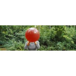  Woman Blowing a Balloon, Germany by Panoramic Images 