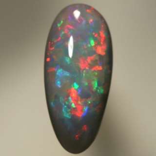 This SOLID Semi Black Opal is from the Lightning Ridge mining fields 