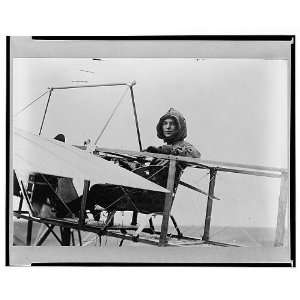  Harriet Quimby in cockpit of plane,1911