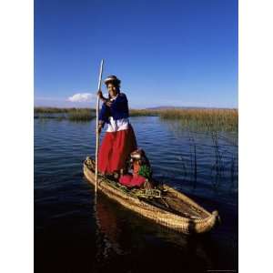 Woman and Traditional Reed Boat, Islas Flotantes, Lake Titicaca, Peru 