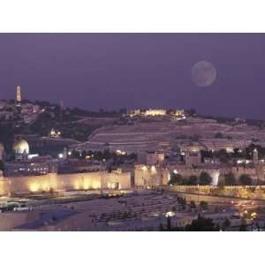 Moon over the Dome of the Rock and Mount Olives in Jerusalem, Israel 