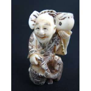  Netsuke with Fish and Basket Patio, Lawn & Garden