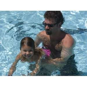 Father Teaches his Child How to Swim, Chevy Chase, Maryland Premium 