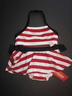 blue snap closure at the neck large skirted bottom is a swim diaper 