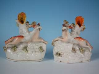 Pair Staffordshire fox & swan spill vases  