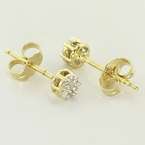   earring contains 7 round brilliant diamonds that are set together in