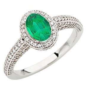 Stunning GEM Quality Oval Columbian Emerald set in 1.50 carat Diamond 