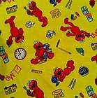 AN ADORABLE ELMO LEARNING YELLOW TOSSED COTTON FABRIC BY THE YARD