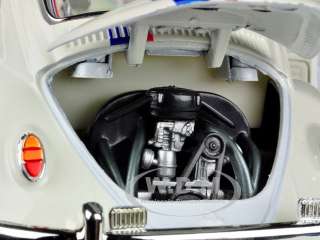   of 1967 volkswagen beetle custom cream die cast car model by road