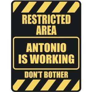   RESTRICTED AREA ANTONIO IS WORKING  PARKING SIGN