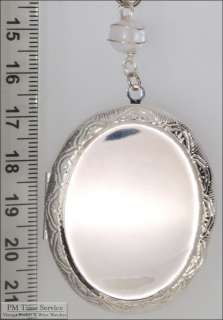 WBM large oval locket, engraved, clear glass bead  