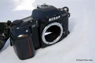 Nikon camera body N6006 with manual strap warranty card  