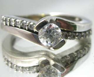   ring with a .33 Carat Solitaire Diamond Si2 Clarity and G H Color