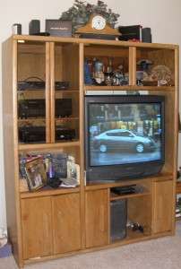   Entertainment Center with 35 Sony TV and Sony 5 Disc CD/DVD Player
