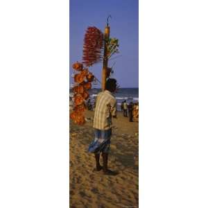 Man Selling Novelty Items on the Beach, Marina Beach, Chennai, Tamil 