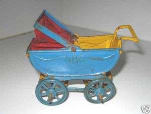 Antique doll house German Penny toy tin doll buggy  