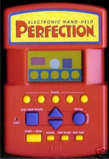 Electronic handheld PERFECTION game by Milton Bradley. Tested, and in 