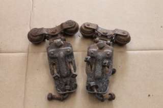   Vintage set of two cannon ball barn door rollers with 9 track  