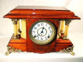 Offering a stunning antique Seth Thomas 8 day adamantine mantle clock 